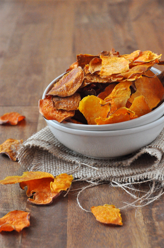 Homemade sweet potato chips fried golden and crispy