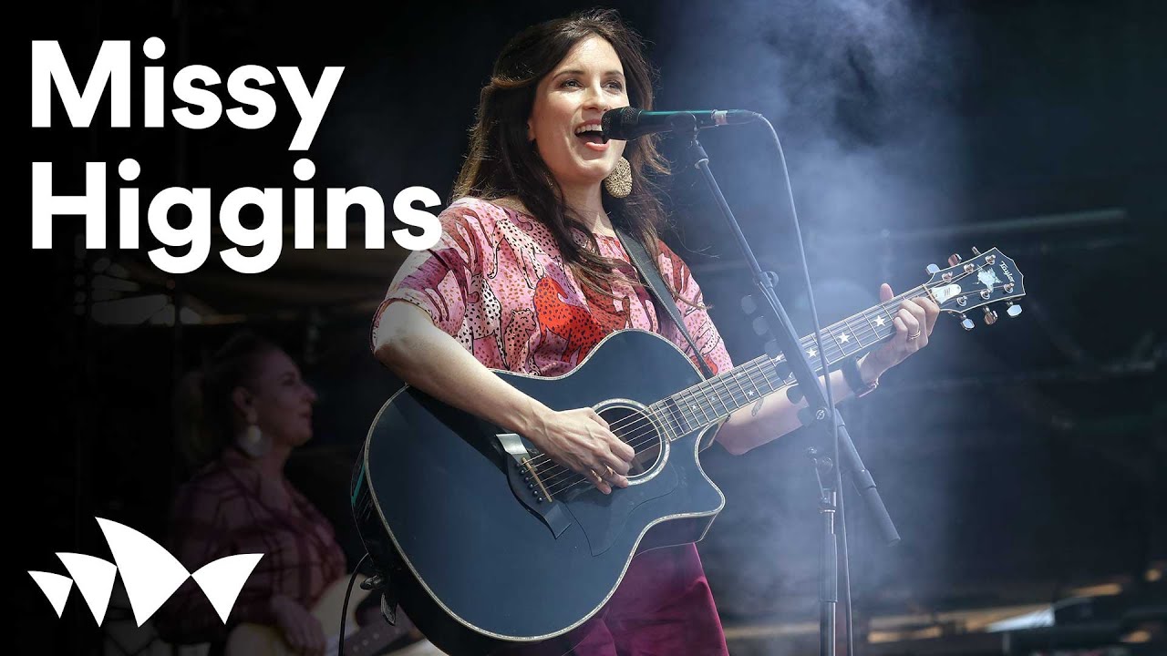 Missy Higgins performing on stage at a live concert