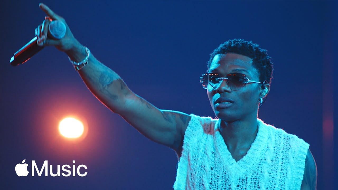 Wizkid performing on stage at a major music event