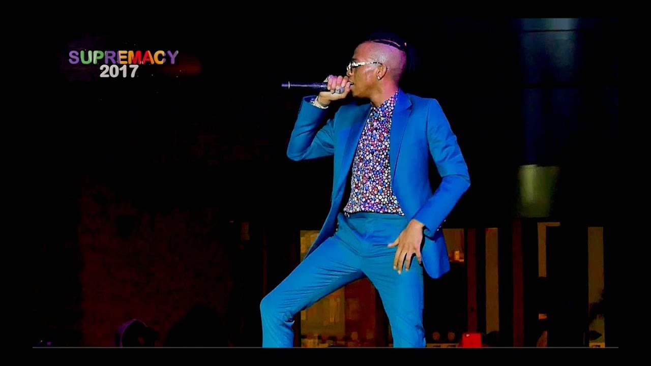Tekno Miles performing live on stage