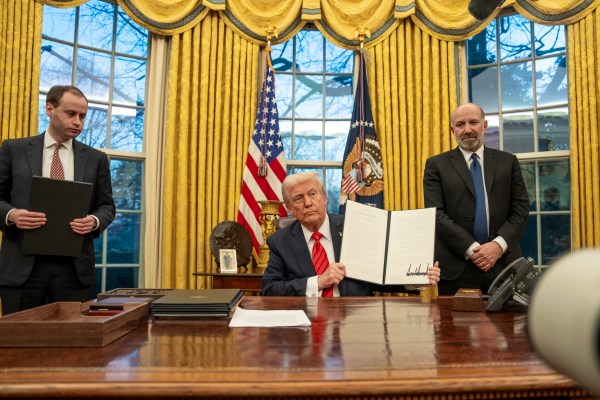 Donald Trump at the White House reviewing executive clemency decisions